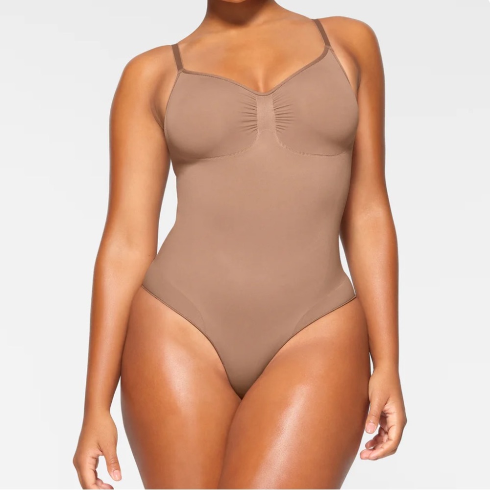 Skims Seamless Sculpt Brief Bodysuit in color Sienna